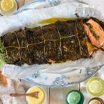 Maggie Beer Instagram - What are some of your favourite Easter traditions? For many, Easter features a bounty from the sea - like this roasted trout wrapped in vine leaves, made all the more scrumptious with a stuffing of pine nuts, currants & preserved lemon. Explore this new recipe via the link in our bio in the Make it a Maggie Easter eCookbook and enjoy it as part of your festive celebration.