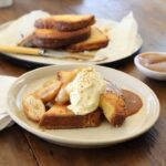 Maggie Beer Instagram - Make breakfast an indulgent delight with Maggie's incredibly moreish brioche French toast with Salted Brandy Caramel and Bananas. A match made in heaven. View the recipe via the link in our bio.