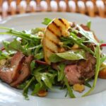 Maggie Beer Instagram - A moreish salad ideal for a lunch among friends, serve this Duck Salad with Grilled Pear, Rocket and Red Wine Vinaigrette with a glass of robust Barossa Valley red wine. View the recipe via the link in our bio and tag a friend who you'd love to share this dish with! #makeitamaggiemoment #lunchrecipes