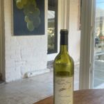 Maggie Beer Instagram - "Colin brought up from the home cellar a lone bottle of Semillon 1999 found hidden in the corner. Can you believe it was still beautiful, drinking the rich, golden hues of an old wine and peach aromatics, still alive in the glass. Given that this vintage is our 50th year as grape growers and from our small wine label, it was a lovely memory of earlier times. We’re half tempted to go back to that simpler label design by our friend, Rod Schubert, a local artist of note. All in all a beautiful trip down memory lane; the painting of grapes by Robert Hannaford on the veranda just seemed to top it all off." - Maggie Beer