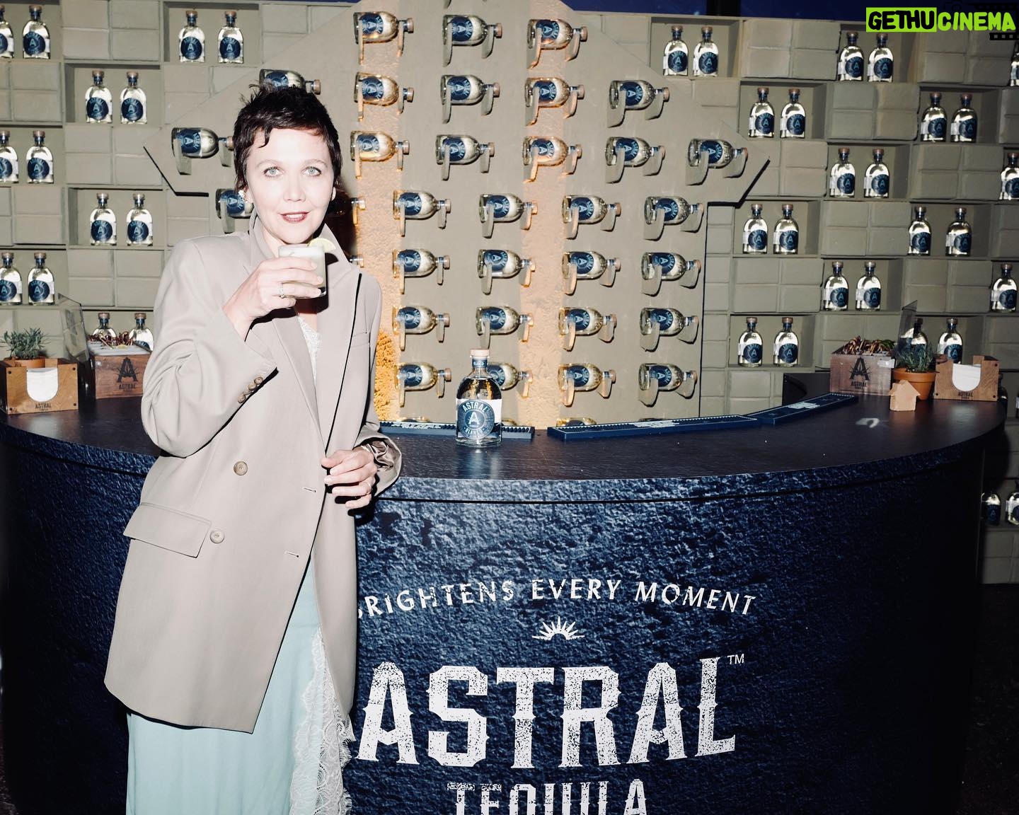 Maggie Gyllenhaal Instagram - #ad Celebrating Cinco de Mayo with @astraltequila (on the rocks w lime ;). Tequila that’s also sustainable. Astral’s leftover agave fibers are upcycled into adobe bricks that are used to construct homes and buildings in local communities in Mexico.