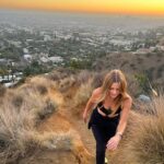 Maggie Lawson Instagram - A little me time this #TravelTuesday While hiking I came across this rusty sign on top of a mountain. It’s not always about the destination it’s about the mindset 🥾 ✨