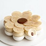 Maja Vase Instagram - Coffee pecan pavlova ☕️🌸 Light and crispy coffee meringue flower with a slightly chewy center, silky smooth coffee white chocolate chantilly, salted coffee pecan praline, and a glittering coffee chocolate flower ✨