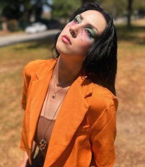 Maliah Arrayah Instagram - I’m just a simple country girl 👀🙂‍↕️ also, Happy June💚🫶🏼🥰. Happy Pride month🌈🫶🏼, Happy Summer Solstice (not quite but so soon omg😍), Happy Malia releases the first of 3 weird satirical poetry books called “shit I don’t say out loud”. Stay tuned 😏🤘🏼💥
.
In case anyone wonders where I get clothes to fit me 😂 
Jeans @fashionnova size 12 inseam 37😌
unitard @boohoo size 12 🫶🏼
Cropped Orange Blazer size 12 @boohoo 
Boots @amazonfashion size 13