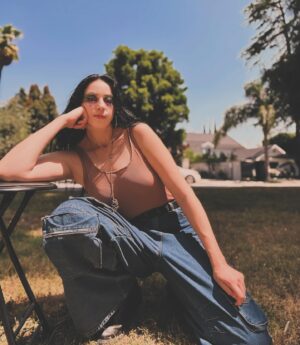Maliah Arrayah Instagram - I’m just a simple country girl 👀🙂‍↕️ also, Happy June💚🫶🏼🥰. Happy Pride month🌈🫶🏼, Happy Summer Solstice (not quite but so soon omg😍), Happy Malia releases the first of 3 weird satirical poetry books called “shit I don’t say out loud”. Stay tuned 😏🤘🏼💥
.
In case anyone wonders where I get clothes to fit me 😂 
Jeans @fashionnova size 12 inseam 37😌
unitard @boohoo size 12 🫶🏼
Cropped Orange Blazer size 12 @boohoo 
Boots @amazonfashion size 13