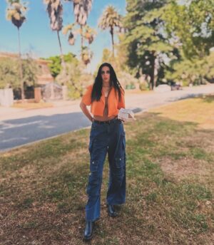 Maliah Arrayah Instagram - I’m just a simple country girl 👀🙂‍↕️ also, Happy June💚🫶🏼🥰. Happy Pride month🌈🫶🏼, Happy Summer Solstice (not quite but so soon omg😍), Happy Malia releases the first of 3 weird satirical poetry books called “shit I don’t say out loud”. Stay tuned 😏🤘🏼💥
.
In case anyone wonders where I get clothes to fit me 😂 
Jeans @fashionnova size 12 inseam 37😌
unitard @boohoo size 12 🫶🏼
Cropped Orange Blazer size 12 @boohoo 
Boots @amazonfashion size 13