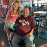 Mallory James Mahoney Instagram - Surprising you today Uncle @tj14griffin and getting to watch you be so happy with your beloved Aggies Win was awesome! Our Uncle Ed Simonini I know is looking Down full of happiness! For my two special uncles that I love so much I’ll say it “Gig ‘Em 👍”