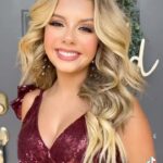 Mallory James Mahoney Instagram - Ladies, lets get ready for this homecoming and holiday season!❤️💋🌹Love my new dress from @azazieofficial ✨Thank you so much @dollsociety_ for the glamorous hair and makeup!