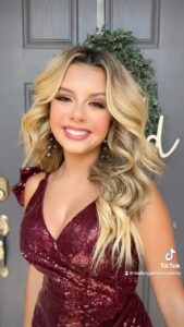 Mallory James Mahoney Instagram - Ladies, lets get ready for this homecoming and holiday season!❤️💋🌹Love my new dress from @azazieofficial ✨Thank you so much @dollsociety_ for the glamorous hair and makeup!