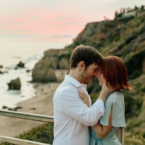 Mandalynn Carlson Instagram - Absolutely loving this stunning photo. Such a fun day and at the end of the shoot, we turned around while leaving and saw this beautiful sunset and just had to capture a photo with it. 
.
📸: @ashleypieperphotography   @_abbyrosephoto_ 
.
.
.
#mandalynncarlson #mandalynn #sunsetmadness #redhead #redhairdontcare #redhairedgirl #redhairbeauty #inlove #inlove😍 #cutecouples #couplegoals❤️ #laphotography #lamodel #malibubeach #sunsetlover #beachsunset #couplephotography #couplephotoshoot