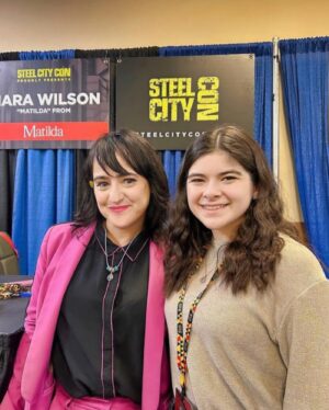 Mara Wilson Instagram - Day Two of #SteelCityCon: more lovely fans, and hanging out with Dora the Explorer (aka the lovely Kathleen Herles) and a fellow Matilda (aka Gabriella Pizzolo)! One day more to stop by, #Pittsburgh!

(And yes, that’s a dandelion behind my ear. A gift from a young fan!)
