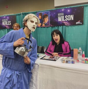 Mara Wilson Instagram - Fun at #GalaxyConColumbus! Hanging out with @kathleenherles (AKA Dora the Explorer), a cute stuffed cat, a truly creative Mrs. Doubtfire cosplayer, and an adorable dog named Sidney!
