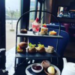 Mara Wilson Instagram - So long, beautiful Newcastle! Loved being at @comicconnortheast and meeting some of the NICEST people I’ve ever met! Special shoutouts to the fans who gave me a box of Cheerios, the woman who NAMED HER DAUGHTER Mara after me (!!!), this adorable dog dressed as Stitch, lovely afternoon tea at @malmaison on the Quay, WONDERFUL Indian food from @simlanewcastle and delicious Jamaican takeaway from Lev’s Delivery, and most of all the AMAZING women at Fenwick’s and the Clinique counter at @marksandspencer, who helped me pick out a beautiful dress and the perfect makeup for the event after BA lost my luggage! (I got it back a day before I left — all’s well that ends well!) I was so sad to leave the kind Geordies (and Scots!), the lovely Toon, and the beautiful countryside. I can only hope to be back soon!