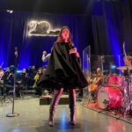 Margherita Vicario Instagram - É successa una cosa strana: il film Gloria! é uscito dallo schermo e s’é materializzato nella vita vera: abbiamo fatto un concerto in Chiesa a Molfetta, metà pubblico un po’ basito, l’altra metà trascinato dal rito. É stato divertente. Alla fine hanno rimbombato le mura ed erano tutti contenti. Ho pensato diverse volte durante queste prime tre date del tour, in questo eccesso di vitalità, che se fossi nata 4/5 secoli fa, m’avrebbero tranquillamente bruciato su un bel rogo! Chissà, magari non avrei avuto il coraggio di essere una vera strega…con la mia piantina nel vaso, lo sguardo di sguincio etcetc…Comunque ho suonato con la meravigliosa @orchestra_magna_grecia che mi ha fatto piangere 8/9 volte, come quando ho sentito per la prima volta Castagne con gli arrangiamenti di @giovannipallotti e del Maestro @patti_carmelo ❤️ Grazie a @vivoconcerti @metatronmgmt onnipresente @camilla_monge, ai miei musicisti e la mia squadra tecnica che ogni volta che li vedo sono felice di stare tra le loro mani. Ah! un grazie speciale alla ragazza che mi ha portato il CIOÉ. Dopo la Messa, ci stava. Le 3500 lire spese meglio della vita. Ci vediamo in tour❤️ PROSSIMA DATA 30 MAGGIO @ateneika_official CAGLIARI CON. BAND!!!