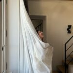 Marie Legault Instagram - Natural light and curtain 🤍📸by @charlotte_bron #behindthescenes #naturalbeauty #photooftheday #lumierenaturelle #feelinggreat #over50model #mannequinseniorfemme #modellife #playful #model #moodoftheday #attitude #barfleur