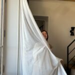 Marie Legault Instagram - Natural light and curtain 🤍📸by @charlotte_bron #behindthescenes #naturalbeauty #photooftheday #lumierenaturelle #feelinggreat #over50model #mannequinseniorfemme #modellife #playful #model #moodoftheday #attitude #barfleur