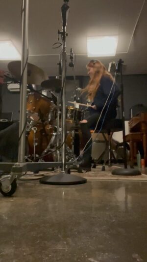 Marlhy Murphy Instagram - the twitch ppl heard this story yesterday on the stream, BUT I was in drum tracking, and about 6 hours in I get a text of the first demo of “you.” and immediately wanted to track the drums because I loved it so much. I asked @michaelkamerman for the files and recorded the drums for it an hour later as the 6th and last song of the day. My hands were bleeding (too many blisters and u can see me using my sleeves to try to protect them from the sticks LOL), but I loved this song sooo much and was so excited to play on it. So, here’s the last take of the day at 9:33pm lol🧡⚒️ #sundaydrumday #drummer