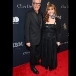 Mary Steenburgen Instagram - This was the first time to the Grammys for both of us. I made one promise to myself that I wouldn’t let all the magic of the music get spoiled for me by wearing torturous shoes (Go Barbie!). So, I wore my beautiful Chanel boots the first night, and my Stuart Weitzman rain boots to Clive Davis’s party and to Grammy night. When we stepped out of the Crypto Arena into the MASSIVE DOWNPOUR, I couldn’t wipe the smile off my face at how warm, dry, and comfortable my feet were. Here are a few shots of our weekend. Seeing @jinglejohnosborne and @luciesilvas, @tjosborne and @abiezervh, was a big dose of family on a magical night. As were the surprise hugs from my soul son, @alexanderdavidisrael. Thank you glam teams @lorencanbymakeup, @claytonhawkins, @fionastiles, @josephchase, @itsamandalim, @_shmian, @albrightfashionlibrary. Thank you especially Harvey Mason Jr. for inviting us, and for you and Brit being two of my most cherished friends. .. . . . . . . . . @gettyentertainment @imagezbylb @monicaschipper @kayla.optics @lestercohenphoto @johnshearer