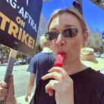 Masha Mashkova Instagram – I am a SAG•AFTRA member which means as an actress it is my time to show solidarity to the community and support TV/Theartical/Streaming Strike. As a member I got a bulletin of what I can NOT do during the strike(no acting, no ADR/looping, no festivals, no promotions of upcoming projects, even on social media etc). It is not mandatory to go out on the streets though, totally your choice. I was hesitant at first… as a Russian, I am kind of scared of protests…but curiosity and the desire to try to live my new life as a responsible civilian, won…
What a beautiful day it was, but there is something I can’t comprehend…. none of us was beaten up(отпизжен по нашему)) by OMON today🤔 
What a joy to watch The First Amendment in action. Feels like I am an alien from another Planet…. Wish such an experience for my motherland as well…As humans, it is our right to peacefully protest if we want a change.
P.S. Got a free popsicle as well!💃🏼 it was a really hot day(Шуточки разгневанных патриотов и говножурналистов, как я сосу у страшной и ужасной Америки-welcome, если вдруг более достойных дел не появилось.)
#sagaftrastrong #sagstrike