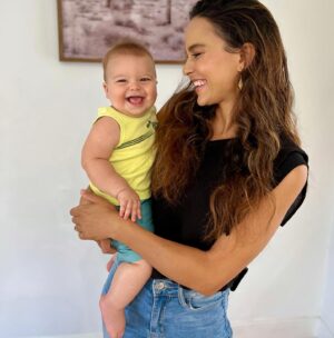 Maya Stojan Instagram - My baby boy is 8 months old today! Someone please press pause on time. My heart continues to grow wider than I could have ever imagined. 
His silliness, his playfulness, the way he discovers each moment as a golden opportunity. 
He laughs at my dumb jokes as if I’m some hot upcoming comedian. 
He only likes adult things, keys, spatulas, remotes, wallets, no baby toys for this guy.
Will army crawl miles if it means getting a grab of his favorite creature, our dog Winston. 
Eats exactly the way I eat, like there’ll never be enough. 
But boy is his little heart full and so is mine. 
#myminime