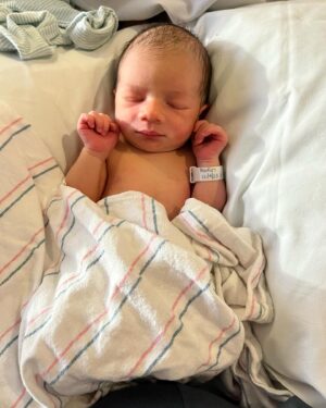Meagan Martin Instagram - Indiana (Indy) Bear Wetmore ❤️!!! We’ve had a little over a week to get to know our little Bear and we couldn’t be more obsessed! He arrived a few days early 12/09/23 at 6lbs 5.6oz and 20.67 inches long. He loves hanging in the backyard with his daddy, drinking lots of milk, and sleeping while held. He hates a diaper changes and a full swaddle, and is learning to like his bassinet at night. My labor was quite long with my water fully rupturing on the 6th, so we got to spend a good chunk of time in the hospital before Indy joined us earth side. It was a wild few days and I’m so thankful for my husband @davewetmore1 who was right there with me through it all! I love you and I couldn’t have done it without you. Huge thank you to my care team, the doctors, L&D nurses, and postpartum nurses! They were all rock stars and made me feel confident and well taken care of even when things felt scary. In the end my OB got to deliver Indy and it was so special and something I will always remember. After almost two years of waiting for a healthy baby, we can finally hold him in our arms. Even though it was a tough road to get here, he was worth the wait ❤️!!!
