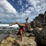 Meagan Martin Instagram – Throw back to handstands and beach time in one of my favorite places of all time, Kauai ❤️! Always bring my @athleticbrewing refreshments with me 🍻🤩!