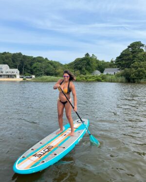 Meagan Martin Instagram - How it started how it’s going 🌊👙🤰🏽!!! So happy my favorite @prana bathing suit still fits halfway through my pregnancy 😍!!! #prAnaAdventurer