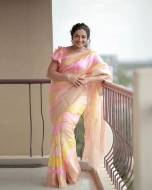 Meera Vasudevan Instagram - Levitate your glamour quotient to new heights with this mesmerising saree from Byhand. Made from the finest, lustrous pure organza silk, this saree exudes an aura of luxury and sophistication. Its lightweight texture and splendid hues allows you to glide gracefully, making every step a statement of grace and poise.

In Frame: @meeravasudevan

Costume by: @byhand.in

Makeup: @unnimayathe artist

Hair: @makeover by nila karthika

Photocredits: @aperture.fox

Banarasi Pure Organza silk saree.

Free shipping in India for orders above 1999/-

DM us for more details or WhatsApp to  91 6282187583

Visit https://byhand.in/

Worldwide shipping available

DM for prices and enquiries.