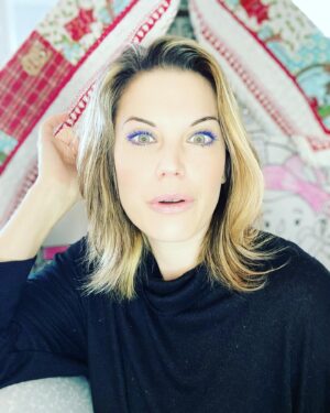 Meghan Ory Instagram - #bluemascara and a cardboard Christmas house. Does this count as #art?!😂😂🤪