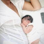 Mekia Cox Instagram - Barely a week old you lay here beside me as I wonder how my love could expand so broadly from a family of 3 to a family of 4. As I recover I remember what you felt like on the inside while we waited (…and waited) for your arrival. Your little body doing what felt like yoga poses in my belly. But now I feel your tiny breath on my tummy and it fills my whole being with joy. I thank your soul for choosing us to be your family. Our new little lady, born 5/13/22, 9lbs 22.2 inches, you are loved. #mamahood #parenthood #love