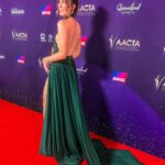 Melanie Bracewell Instagram – I got a beautiful dress made for the AACTAs by the incredible @jasongrech. LOOK AT ME. Makeup by: @claireandreaa