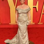 Melanie Lynskey Instagram – THANK YOU @radhikajones and @vanityfair for having us at the best party of the year. I have blisters running along the line of my toenails but it was worth it!! Thank you to my husband for being SO HANDSOME and a very fun date. Eternal thanks to the wonderful @csiriano for this stunning custom dress and to everyone who works with Christian for the time and expertise and fittings and beautiful tailoring. I’m so lucky. 
Impeccably styled by my dear dear friend @misha_rudolph_stylist wearing gorgeous @martinkatzjewels – my gosh they were stunning. Thank you Martin and @periellenb we love you so!
@tylerellisofficial had the most perfect bag. Thank you @aimeecarpenter17 
Thank you to my beloved @stephensollitto, the funniest and kindest man alive, for this beautiful makeup. 
Thank you to the talented and lovely @tedgibson for this perfect hair.  You are an angel Ted and such a gentle and loving person. 
Thank you @nailsbyshige for saving my raggedy hands and doing my favourite tiny hearts and for bringing your sparkly sweet energy to my house. 
Thank you sweet @sophie.a.miller for a long long long day babysitting!! 💖
And thank you @VanityFair and @gettyentertainment for these red carpet pictures. #VFOscars #VanityFairOscarParty