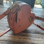 Melanie Lynskey Instagram - I got to have a poppet date night on Wednesday and celebrate the launch of this amazing collaboration between @coach and @observedbyus and @kirstendunst. These pieces are so special and so unique and beautiful, clearly made with love and as a result of such a sweet friendship. There are ants on this heart bag!! It’s so charming! Every person at the dinner was wonderful and it really felt like hanging out with friends. You know how people always ask “who would you have at your dream dinner party?” Well now I know my answer, and it includes @stuartvevers @domfishback @observedbyus @kirstendunst and Jesse @hilaryduff @matthewkoma @negga.ruth @addison.timlin @evanrosskatz and my poppet @magslawslawson. And getting to congratulate Dom on the Emmy nomination I NEEDED to happen was so joyous. Feels a bit funny to post about anything other than the strike, but this really was a special night and is a super lovely collaboration and I wanted to say thank you 💖 Hair!! @dickycollins- makeup! @kristeeliu - styling and running all over town! @misha_rudolph_stylist Images: @bfa @jojo_jpeg @matthewyoscary Edited to say these shoes are also @coach !! Because people are rightfully very excited about the shoes