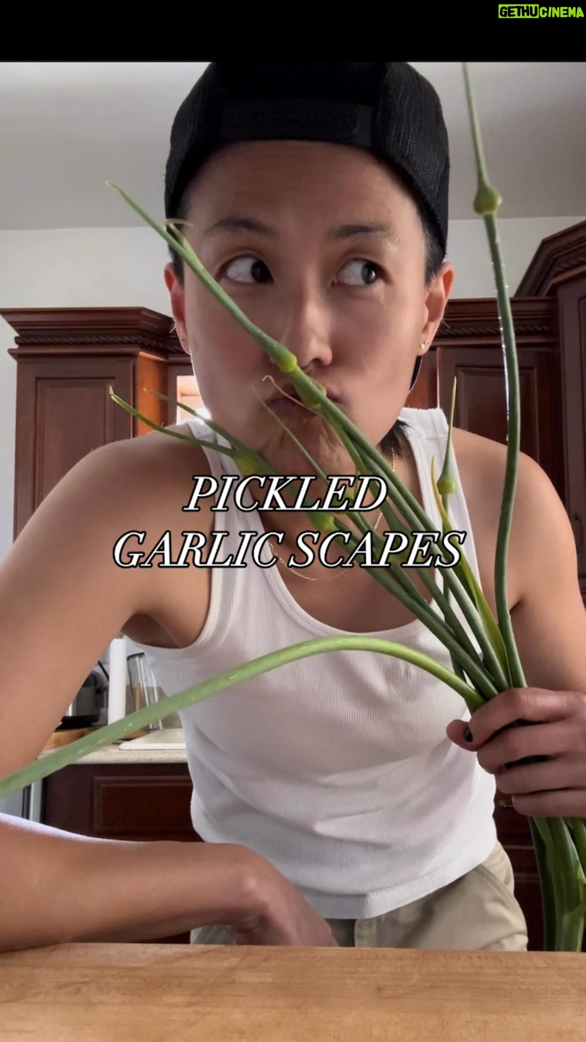 Melissa King Instagram - Picked up some garlic scapes from the farmers market yesterday. These beautiful long, curvy stems pop up during a small window of time around late spring/early summer and have a mildly garlicy, oniony, sweet scalliony flavor. I’m quick pickling some so I can enjoy them over the next few months. My quick pickle brine: 2 cups unseasoned rice vinegar 1½ cups sugar 2 teaspoons kosher salt 2 x 1-inch knob ginger, peeled and thinly sliced 2 garlic cloves, peeled and lightly smashed Chili pods and other spices, optional Bring brine and aromatics to a rapid boil, and pour over 2 cups of cut scapes (or other vegetables). Allow to cool before refrigerating. Store for several months. Music: @thebeachesband - T-shirt