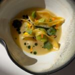 Melissa King Instagram - A vegetable dish inspired by my Hong Kong heritage and the beauty fo spring! 🌱 Spring Pea Wontons • Yuzu Broth • Charred Scallion Oil BTS shoot with @lamer 💚