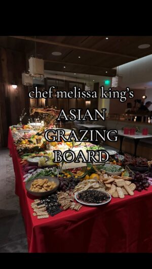 Melissa King Instagram - I don’t half ass anything. 🤪 I’ve had an all Asian grazing board vision hiding in my head for a while and am so proud to debut it to friends in celebration of the Lunar New Year. Along with some usual suspects of charcuterie, dips, vegetables, I loaded the 13 foot table with dim sum, every nostalgic Asian snack you can dream of, and a few roasted suckling pigs for the win! We built a second table just to hold the desserts (egg tarts, fried sesame balls, lucky candies, lychee jello cups, and more). I felt emotional after stepping back and seeing all the nostalgia captured on the table. Grandma would have been so proud and parked up next to the kumquats and licorice watermelon seeds. Thank you to all the friends that came out to support and celebrate. Cant wait to go even harder next year! Happy year of the dragon everyone!🧧🐲🐉

Thank you to @staym88 and the team, @chefgingerjpierce and the @1hotels team, @therealtsarnicoulai and all our sponsors for helping me make this come to life and being a big part of our Lunar celebration. 

#lunarnewyear #chefmelissaking #melissaking #chinesefood #cantonesefood #chinese #foodporn #grazingboard #charcuterieboard #asianfood #asiangrazingboard #LNY