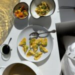 Melissa King Instagram - A vegetable dish inspired by my Hong Kong heritage and the beauty fo spring! 🌱 Spring Pea Wontons • Yuzu Broth • Charred Scallion Oil BTS shoot with @lamer 💚