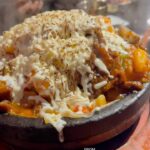 Melissa King Instagram - Korean galbijim with torched cheese making me feel thingsss 🔥🔥🔥(braised short ribs, oxtails and tendons loaded with carrots, daikon, rice cakes, noodles) @daeho_official