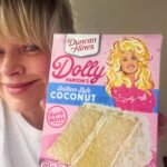 Melissa Peterman Instagram - @dollyparton helped me bake a coconut cake today. Yes, I toasted the coconut. I didn't hear her say "groundbreaking choice" but I felt her approval from the box. #delicious #dollyparton #dollypartonduncanhinescake @realduncanhines #coconutcake