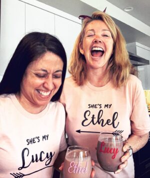 Melody Thomas Scott Instagram - Sixty-four is starting out with a bang! Doug and I are modeling some of my #quarantinegifts! Being #quarantined ain’t bad at all when your best friend is stuck with you! The three of us are on Day 37 and still laughing our way through the confinement. Watched “Ethel’s Birthday” epi of #ilovelucy❤️ and howled as always! Reilly 🐶 is loving having us here 24/7. So am I! #hanginthere #thelightiscoming #enjoythelittlethings #instagraMELable 🍷🎂🍸🙋🏻‍♀️💕👩🏼‍🦱👯‍♂️🐶🐱🥂🍷🍾🎹🎲🎈🎁♌️ @claudb4177