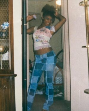 Melody Thornton Instagram - Get into this Y2K brilliance! Yes… I dressed like this to school. Yes… my eyebrows were non existent. I dyed my hair a jet black as I could get it! The patchwork pants 😩 I would pay 💰 loot for those now.