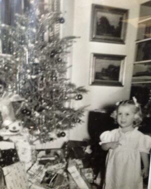 Mia Farrow Instagram - This was a Christmas Eve long age. ( the first i can truly remember). Santa was on his way and i was too excited to sleep. I think i was asking my parents if they were sure that Santa knew i was here.  My dad snapped  this photo