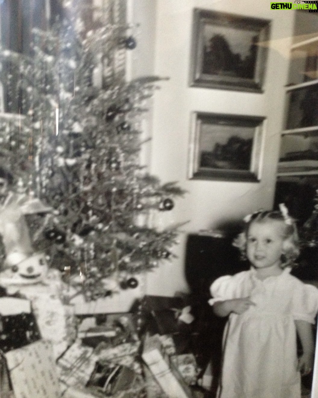 Mia Farrow - 1.8K Likes - This was a Christmas Eve long age. ( the first i can truly remember). Santa was on his way and i was too excited to sleep. I think i was asking my parents if they were sure that Santa knew i was here. My dad snapped this photo