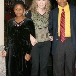 Mia Farrow Instagram - Its one of those days when i find myself missing a time when the kids were little.  In the photo Im with Quincy and Isaiah. We were at a premier in NY.  As a single mom iI needed to work.  Sometimes I had to travel, but I did my best to minimize that & took them with me whenever possible.(one year, despite being hopeless at math, i home schooled Quincy). Now, my two youngest are in their 30s with lives of their own; Quincy has two gorgeous little girls, a great husband, beautiful home in the countryside with lots of land, chickens, a big  barn, ponies for neighbors & the state’s top primary school in town  She is a rising star in real estate and an officer in her branch of the NAACP.  Shes getting honeybees next Spring.  Her husband is an electrician. They are so cute & loving together! (Their accountant  says they’ll be able to retire at 46. WOW!). Isaiah lives in a vibrant city nearby & has a great job - (beat out some fierce competition) He also plays in a band. After college he taught at a prep school in Bangkok- initially for a year but he fell in love with Thailand & stayed for 5. - He didn’t want to leave-  he had friends & a lovely apartment . I get it. Thailand is beautiful. People are extraordinarily kind.  Life is more relaxed. He is an adult & I respect his decisions. But i missed him. And when he couldn’t extend his visa further, he came back! I am elated. Transitions can be overwhelming, but he did it all- reconnecting with old friends & making new ones. He now has the job he most wanted- assisting people with intellectual disabilities.  People of all ages have always loved his company.  He has a car & we get to visit. So, my 2 youngest have found the joy in helping others.  In Feb, God willing, i’ll begin my 80th year of life!  Like everybody, I’ve known disappointment, worry and the ceaseless pain that comes from losing dearest loves. I  have surely made a zillion mistakes along the way.  But i am truly blessed. I love my friends, and my sisters. I’ve loved to work & above all, the children in my life- they bring love, meaning, awe & joy. I am more grateful than i have words to say.  THANK YOU ♥️🙏🏽♥️ i love you so very much