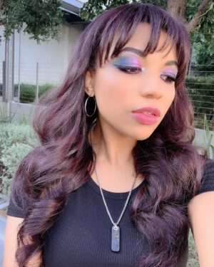 Mica Burton Instagram - I will never stop posting this makeup look from 2019 every pride month just like I will never stop being SUPER LOUDLY 🩷💜💙 BISEXUAL 💙💜🩷. Can you hear that iced coffee being shaken aggressively in the distance? It’s mine and it’s a lavender oat milk latte and I am READY FOR PRIDE. 

I am so lucky to be able to join so many others celebrating who we love and how beautiful the way we live our lives is. And to all of you who are reading this and maybe are going through a personal journey, not out for any number of reasons, or don’t feel the need/want to crank the queer up to 11 during June: you are seen and loved and valid. 

Happy pride, everyone. Let’s all strive to be extra kind this month, yeah?