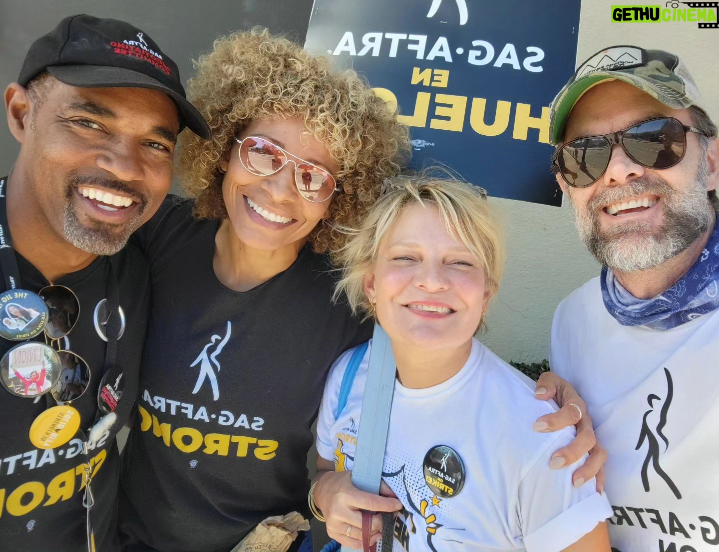 Michelle Hurd - 2.7K Likes - Today at WB, there was such a strong, inspiring group of people picketing. I had the pleasure of marching with my negotiating committee brother @jasonwinstongeorge , my dear friend @marthaplimpton, and, of course, my wonderful husband @garretdillahunt.
All of you out there picketing for the right to earn a living wage, inspire me, and keep me fighting the good fight!!
One Day longer, One day stronger, As long as it takes!!
#sagaftrastrong #sagaftrastrike