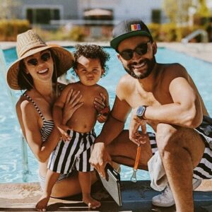 Michelle Kim McCoy Instagram - Stripes with a dash of stank face. A picture perfect MOMENT captured by @amanduhmcdee. We’re dealing with a no-nap, overtired tantrum-filled toddler who could give two 💩💩 that I was going to get our matching family photo NO MATTER WHAT 😵‍💫☀️