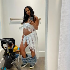 Michelle Mitchenor Instagram - INT: MALL DRESSING ROOM. Pregnant mom ventures out w/ cranky toddler & big ol belly to try clothes on as quickly & as swiftly as possible w/out bending over to take off jeans & shoes b/c she has 5 minus T seconds be4 her toddler explodes.🫣🤣 😂😂 Yah do what yah gotta do in these muvahHOODstreets 

#muvahood #twopieceloading #8months #pregnant 

Also @doonausa is one of my fav brands! Esp as a traveling working muvah I mean it’s a MUST have if you not tryna lug one of those Cadillac strollers. This trike and the car seat/stroller are definitely getting passed down! Too bad they don’t have a double stroller thooo 🥹🥹🥹