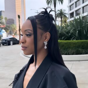 Michelle Mitchenor Instagram - @naacpimageawards NOMINÉE Brunch 🥷✨
Trench Set : @beeombi 
Earrings : @veronicatharmalingam 
Clutch : @cultgaia 
Makeup @theninjafilter 
Hair : @stylesbydavonte 
Nails : @theonlynailsofficial 
Wedding Ring Set : @emilyesterling 
Thank you @pr_solo
