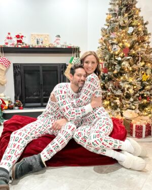 Michelle West Instagram - “Merry Christmas Eve Eve” IYKYK 😆 With a hectic few weeks, we didn’t manage to get the pics I envisioned yet but these put a smile on my face and we had fun while capturing them! Bernie on the other hand, over it 😂

#matchingpajamas #familyfirst #christmaspajamas #positiveinfluencer #teamwest #familymatching